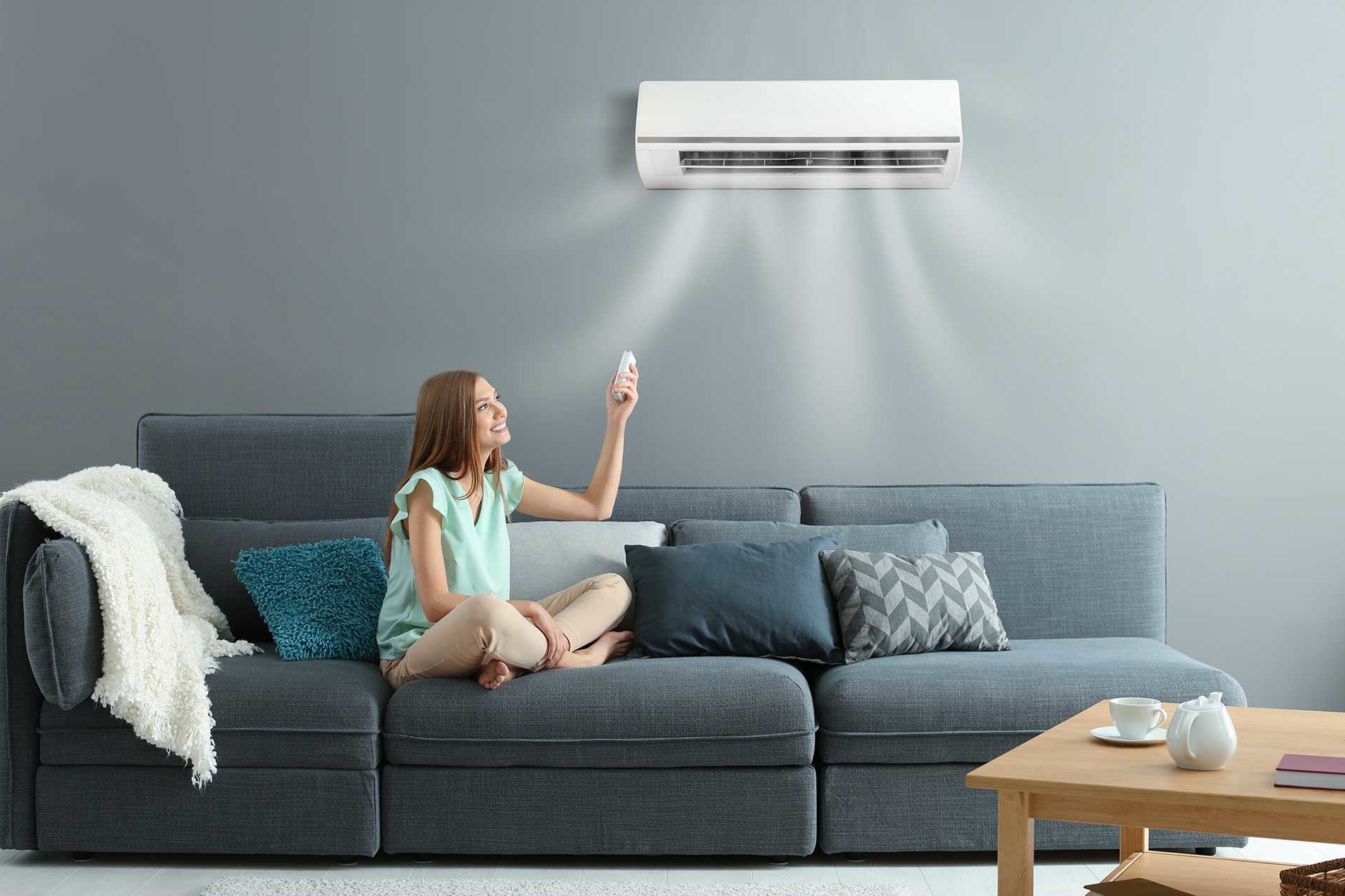 a women having fresh breath with air con